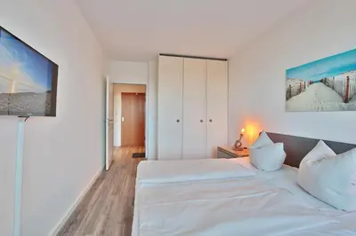 Ein Bett oder Betten in einem Zimmer der Unterkunft Haus Meeresstrand Appartement 