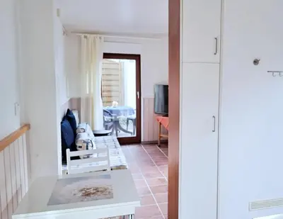 TV/Unterhaltungsangebot in der Unterkunft Obj 47 Ferienbungalow für 2 Personen WLAN Terrasse ca 300 m zum Strand