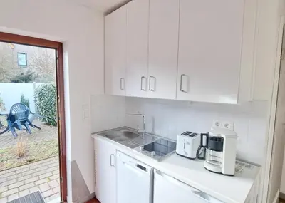Küche/Küchenzeile in der Unterkunft Obj 47 Ferienbungalow für 2 Personen WLAN Terrasse ca 300 m zum Strand