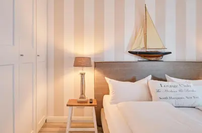 Ein Bett oder Betten in einem Zimmer der Unterkunft Domizil am Möwenberg 16 Baltic Suite Scharbeutz Apt 5