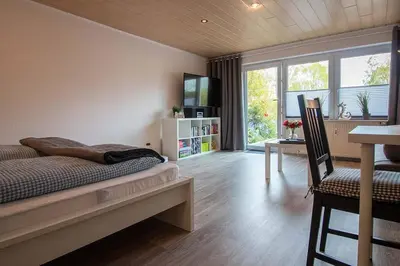 Ein Bett oder Betten in einem Zimmer der Unterkunft Strandschnecke 1