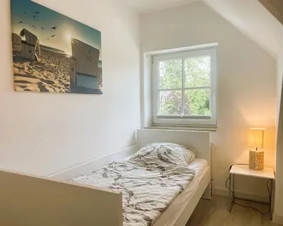 Ein Bett oder Betten in einem Zimmer der Unterkunft Ferienhaus Sonnenblick