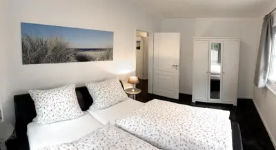 Ein Bett oder Betten in einem Zimmer der Unterkunft Ferienwohnung auf einem Reiterhof
