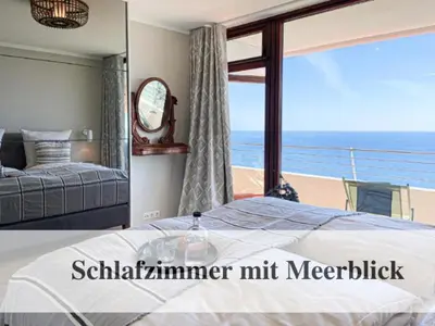 Ein Bett oder Betten in einem Zimmer der Unterkunft Premium Ferienwohnung mit Meerblick