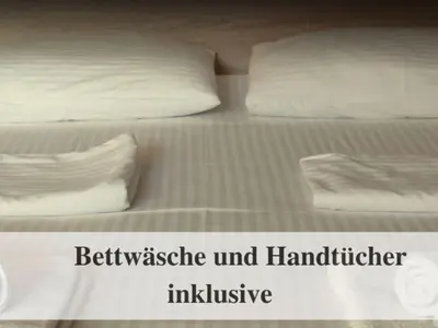 Ein Bett oder Betten in einem Zimmer der Unterkunft Premium Ferienwohnung mit Meerblick