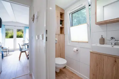 Ein Badezimmer in der Unterkunft Ostseecamp Ferienhaus 