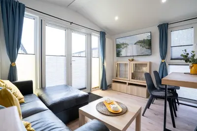Ein Sitzbereich in der Unterkunft Ostseecamp Ferienhaus 