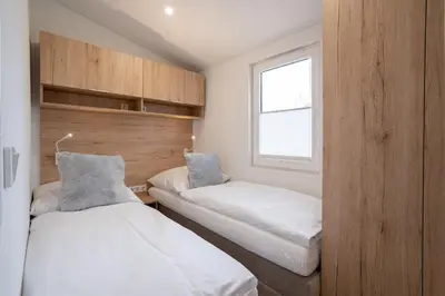 Ein Bett oder Betten in einem Zimmer der Unterkunft Ostseecamp Casa de la Playa