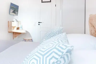 Ein Bett oder Betten in einem Zimmer der Unterkunft Seestraße 24 Seamaster