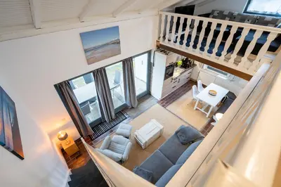Ein Sitzbereich in der Unterkunft AMW8d Ferienhaus Moin