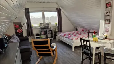 Ein Bett oder Betten in einem Zimmer der Unterkunft Ostseezauber 2, Ferienwohnung am Strand