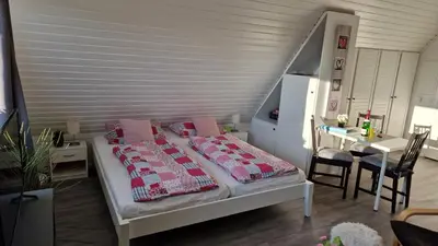 Ein Bett oder Betten in einem Zimmer der Unterkunft Ostseezauber 2, Ferienwohnung am Strand