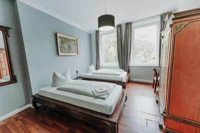 Ein Bett oder Betten in einem Zimmer der Unterkunft Apartments im Herzen Lübecks