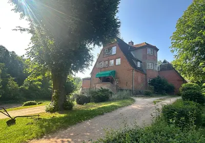 Ein Garten an der Unterkunft Reiterpension Marlie