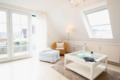 Ein Bett oder Betten in einem Zimmer der Unterkunft Villa Wilhelma Apartment A2 1 OG