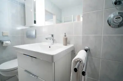 Ein Badezimmer in der Unterkunft OST29c Ferienwohnung Urlaubsglück