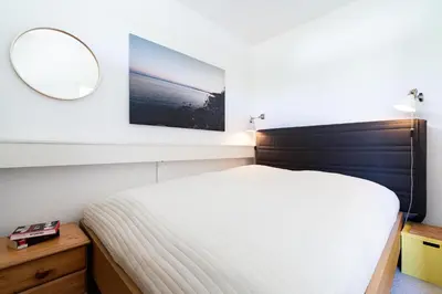 Ein Bett oder Betten in einem Zimmer der Unterkunft Ferienpark Sierksdorf App 180