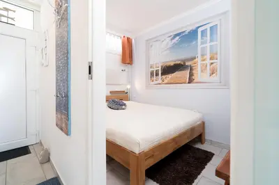 Ein Bett oder Betten in einem Zimmer der Unterkunft Ferienpark Sierksdorf Ostseeloge