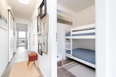 Ein Bett oder Betten in einem Zimmer der Unterkunft Ferienpark Sierksdorf App 148