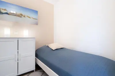 Ein Bett oder Betten in einem Zimmer der Unterkunft Ferienpark Sierksdorf App 148