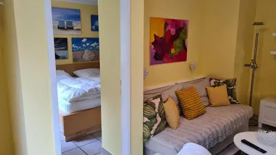 Ein Bett oder Betten in einem Zimmer der Unterkunft PEMATRA FeWo Mollenhauer