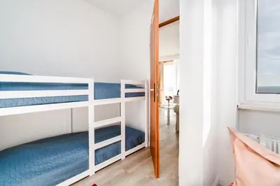 Ein Bett oder Betten in einem Zimmer der Unterkunft Ferienpark Sierksdorf App 311