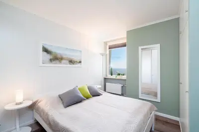 Ein Bett oder Betten in einem Zimmer der Unterkunft Ferienpark Sierksdorf App 529