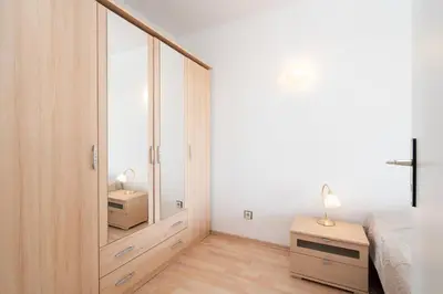 Ein Bett oder Betten in einem Zimmer der Unterkunft Ferienpark Sierksdorf App 701