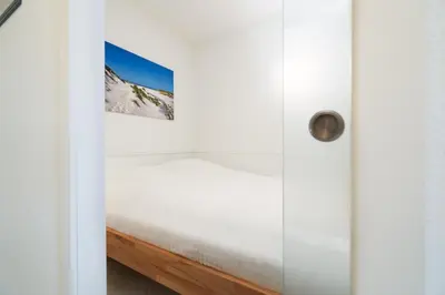Ein Bett oder Betten in einem Zimmer der Unterkunft Ferienpark Sierksdorf App 693