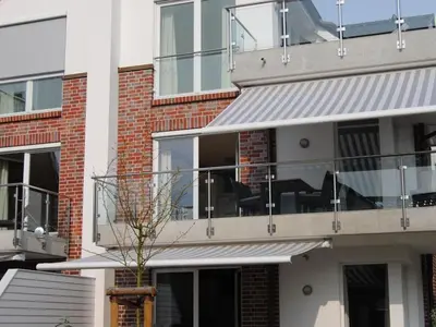 Ein Balkon oder eine Terrasse in der Unterkunft Deck 3 Modern retreat