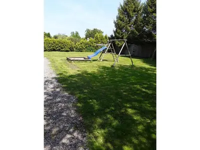 Ein Kinderspielbereich in der Unterkunft Bolliger Modern Retreat