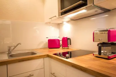 Küche/Küchenzeile in der Unterkunft Meer & Strand - Haus Meeresstrand Ferienwohnung 103