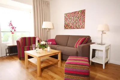 Ein Sitzbereich in der Unterkunft Meer & Strand - Haus Meeresstrand Ferienwohnung 205