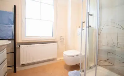 Ein Badezimmer in der Unterkunft Villa Wilhelma Strandallee 146 Villa Wilhelma Apartment 4