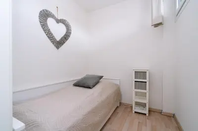 Ein Bett oder Betten in einem Zimmer der Unterkunft Ferienpark Sierksdorf App 224