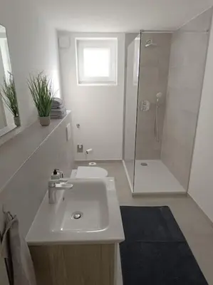 Ein Badezimmer in der Unterkunft Strandnahe Ferienwohnung