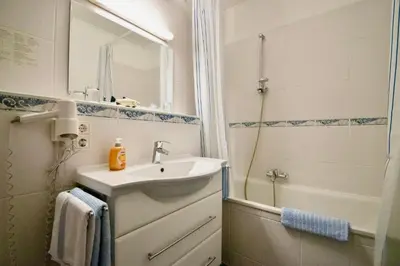 Ein Badezimmer in der Unterkunft Villa Wilhelma Strandallee 146 Villa Wilhelma Apartment 6