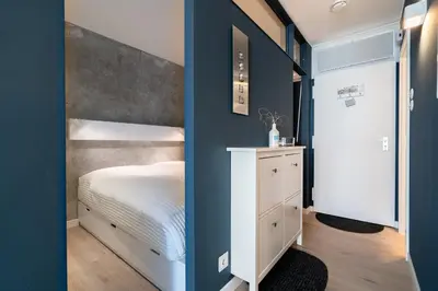 Ein Bett oder Betten in einem Zimmer der Unterkunft Ferienpark Sierksdorf App 342