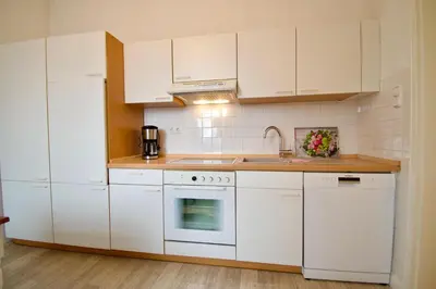 Küche/Küchenzeile in der Unterkunft Villa Wilhelma Strandallee 146 Villa Wilhelma Apartment 18