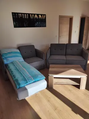 Ein Sitzbereich in der Unterkunft Zum Keglertreff