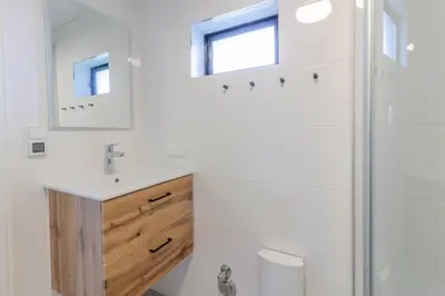 Ein Badezimmer in der Unterkunft Küstennest