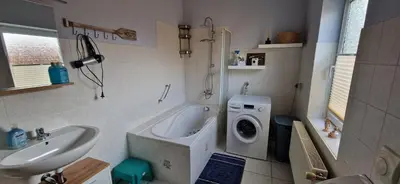 Ein Badezimmer in der Unterkunft Familienfreundlicher Ferienbungalow Sunnyside