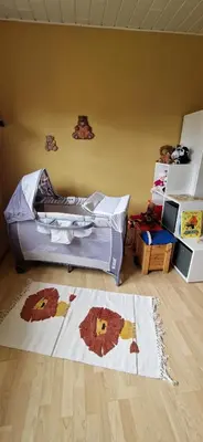 Ein Bett oder Betten in einem Zimmer der Unterkunft Familienfreundlicher Ferienbungalow Sunnyside