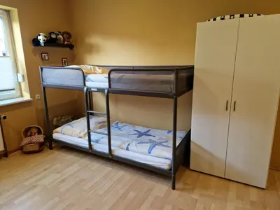 Ein Bett oder Betten in einem Zimmer der Unterkunft Familienfreundlicher Ferienbungalow Sunnyside