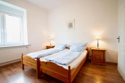 Ein Bett oder Betten in einem Zimmer der Unterkunft Villa Wilhelma Strandallee 146 Villa Wilhelma Apartment 2