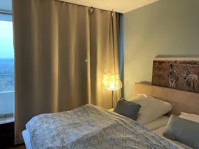Ein Bett oder Betten in einem Zimmer der Unterkunft 27up Über den Wolken in Timmendorfer Strand