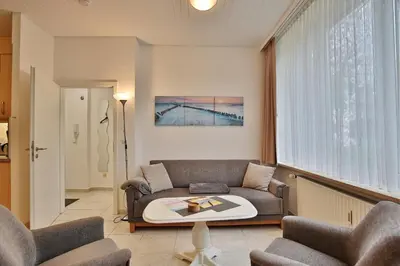 Ein Sitzbereich in der Unterkunft Die Insel Appartement 19