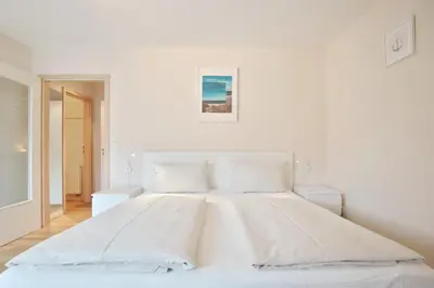 Ein Bett oder Betten in einem Zimmer der Unterkunft Haus Ostseeallee Appartement 60