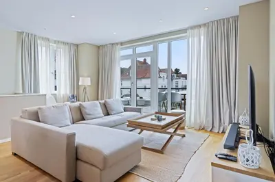 Ein Sitzbereich in der Unterkunft Villa Godewindpark Travemünde 01