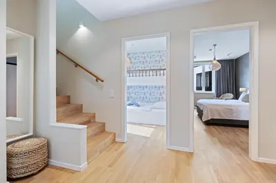 Ein Bett oder Betten in einem Zimmer der Unterkunft Villa Godewindpark Travemünde 01